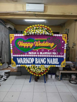 Papan Bunga di Batealit